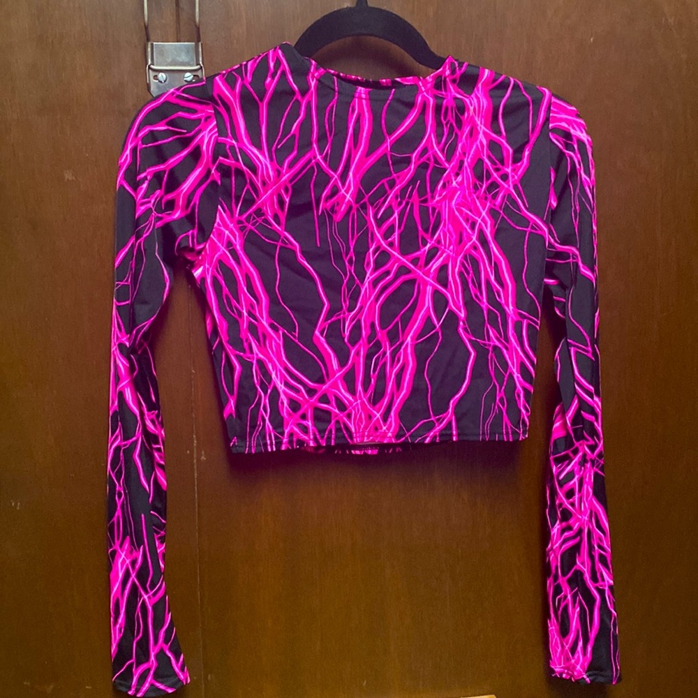 Pink lightning long sleeve crop top.